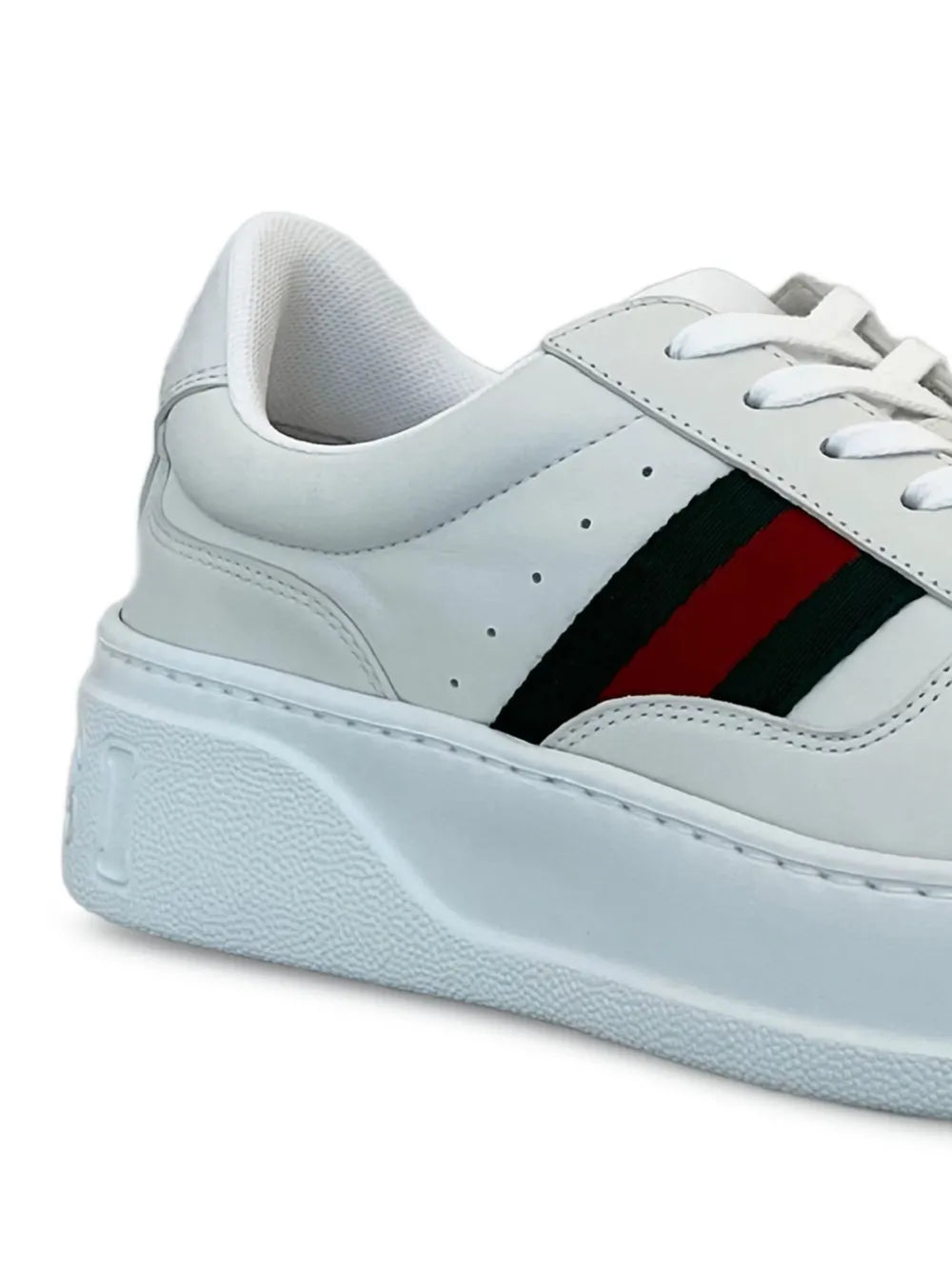 Gucci lace-up sneakers with white leather upper and thick light-blue sole, stripe detail.