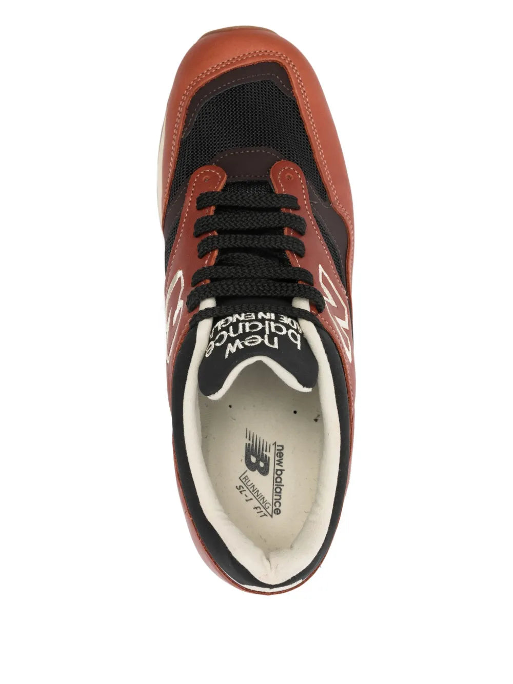 Orange and black New Balance 1500 lace-up sneakers, open toe shows cushioned interior