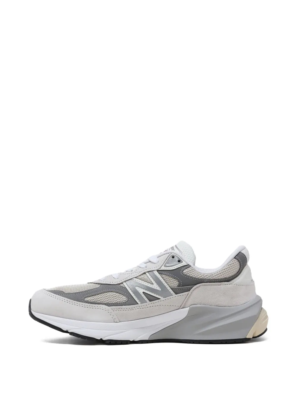 Grey and white New Balance 990V6 sneakers, sporty side profile and foam midsole