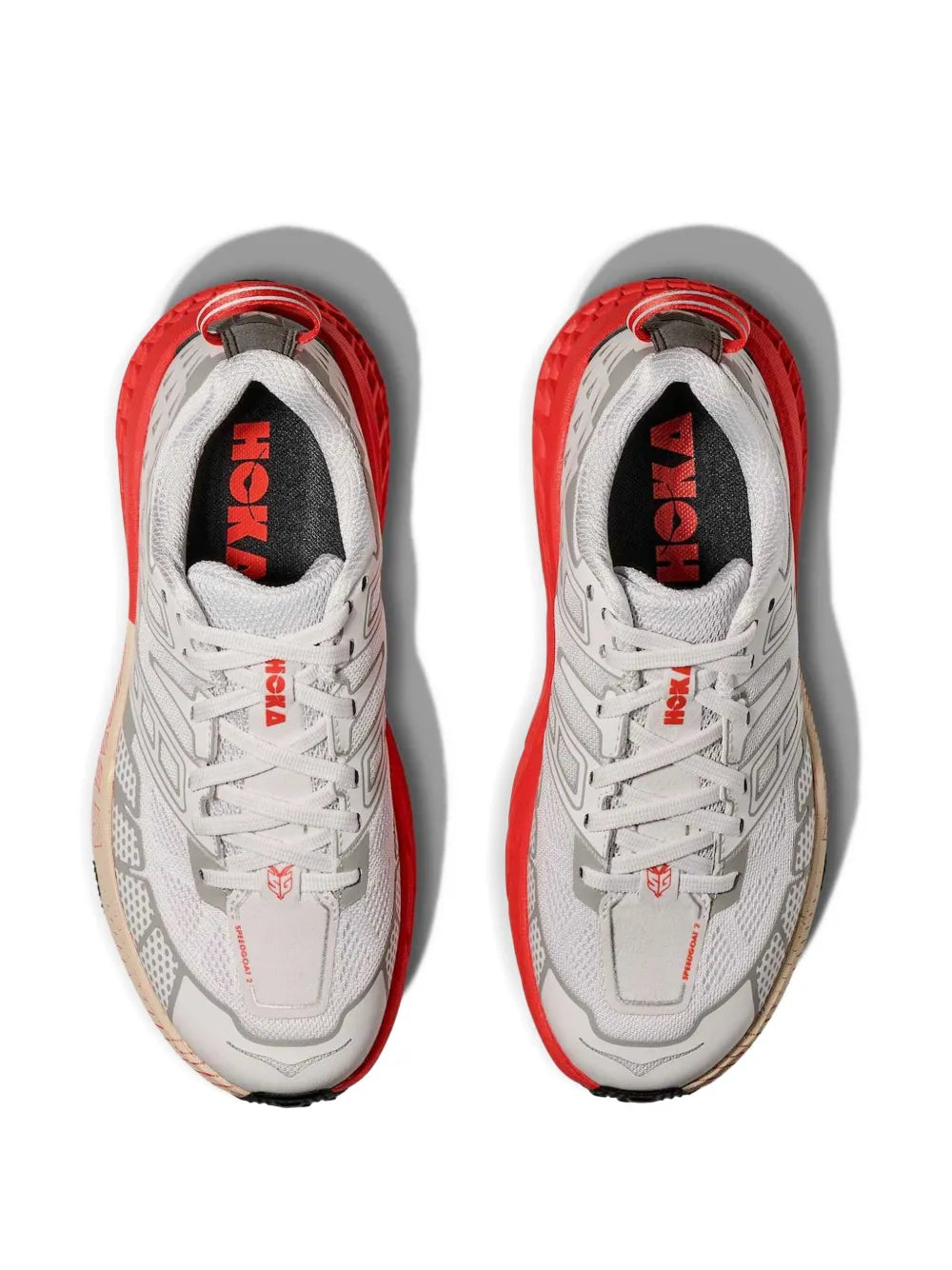 Pair of Hoka Speedgoat 2 low-top sneakers, light grey with red laces