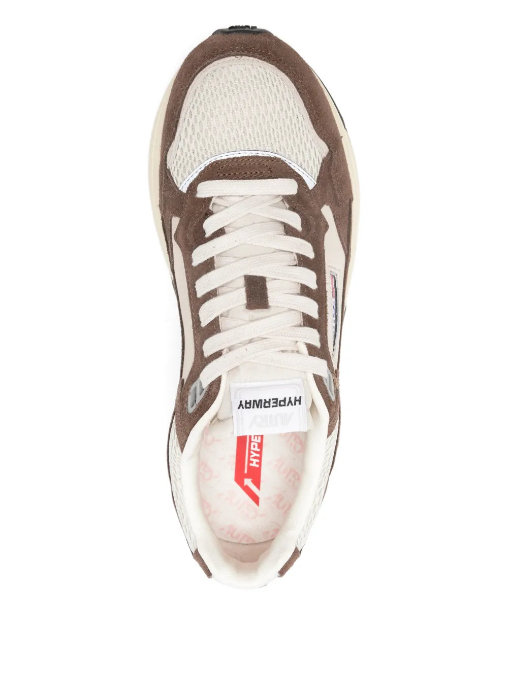 Brown and cream lace-up sneaker with white laces and branded insole label