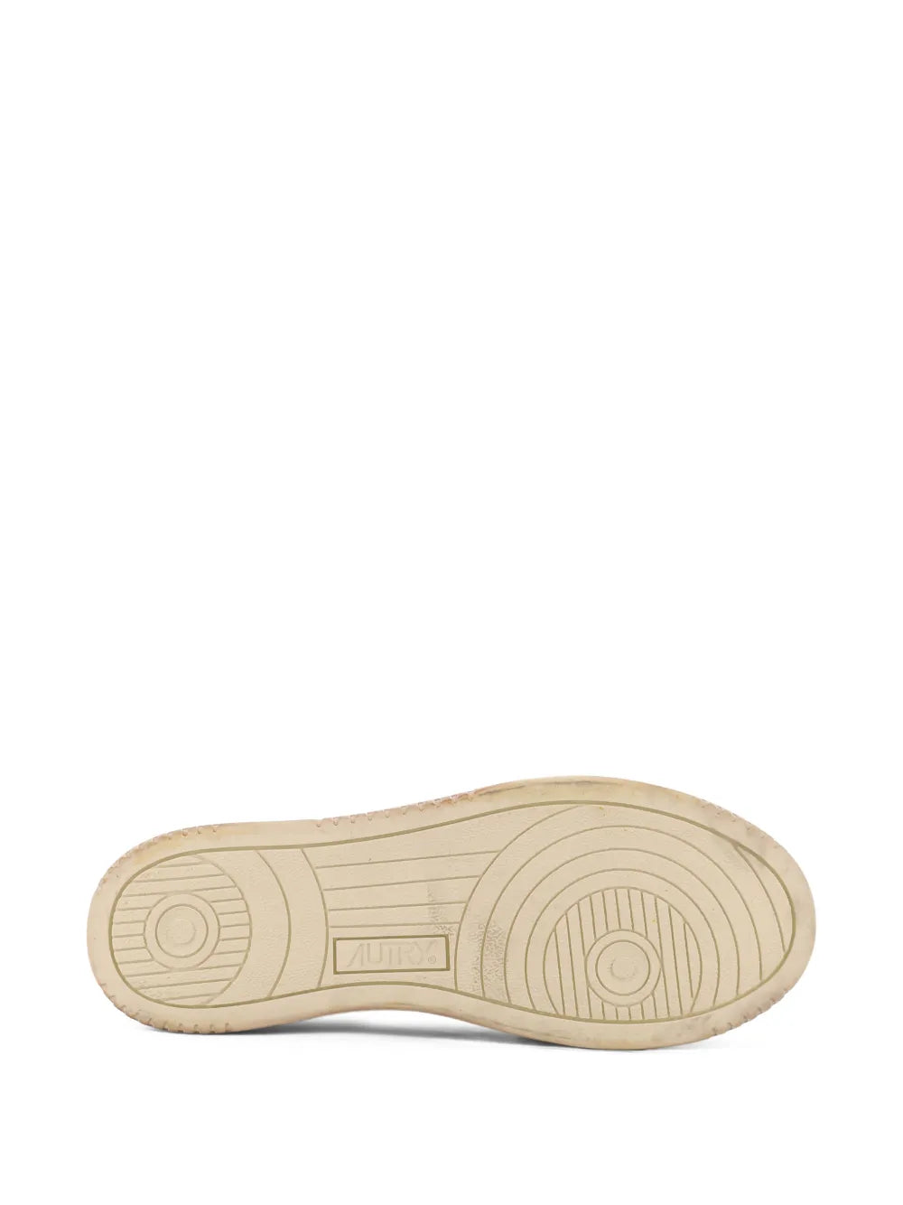White sneakers rubber outsole with circular traction tread pattern