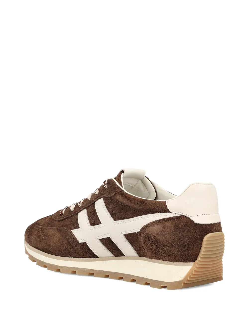 Brown sneakers with white side logo, cream heel and ridged sole, side view