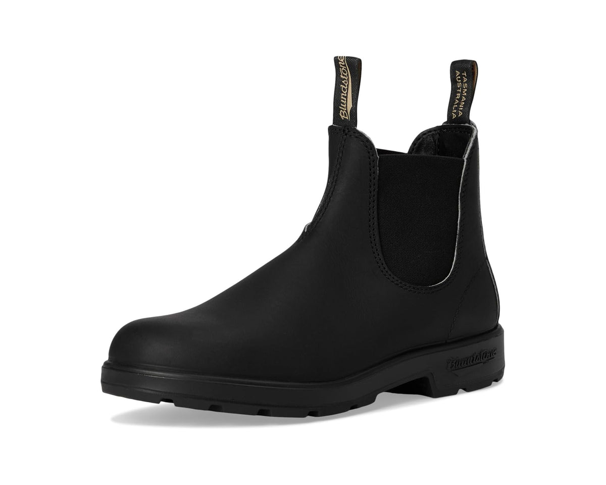 Black Chelsea boots with elastic gores and pull tabs, rugged tread sole