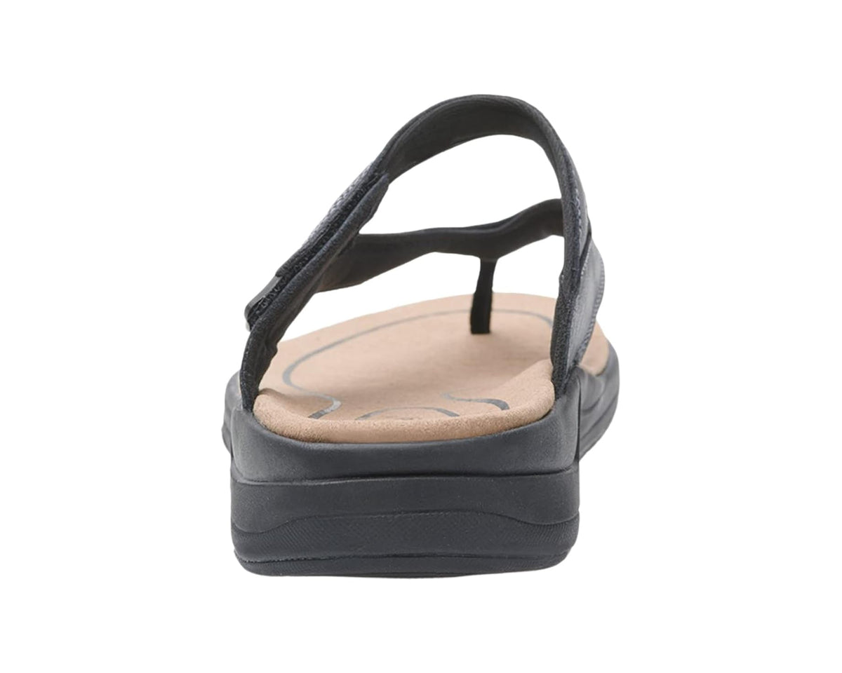 Black slide sandals with thong strap and cushioned footbed and heel
