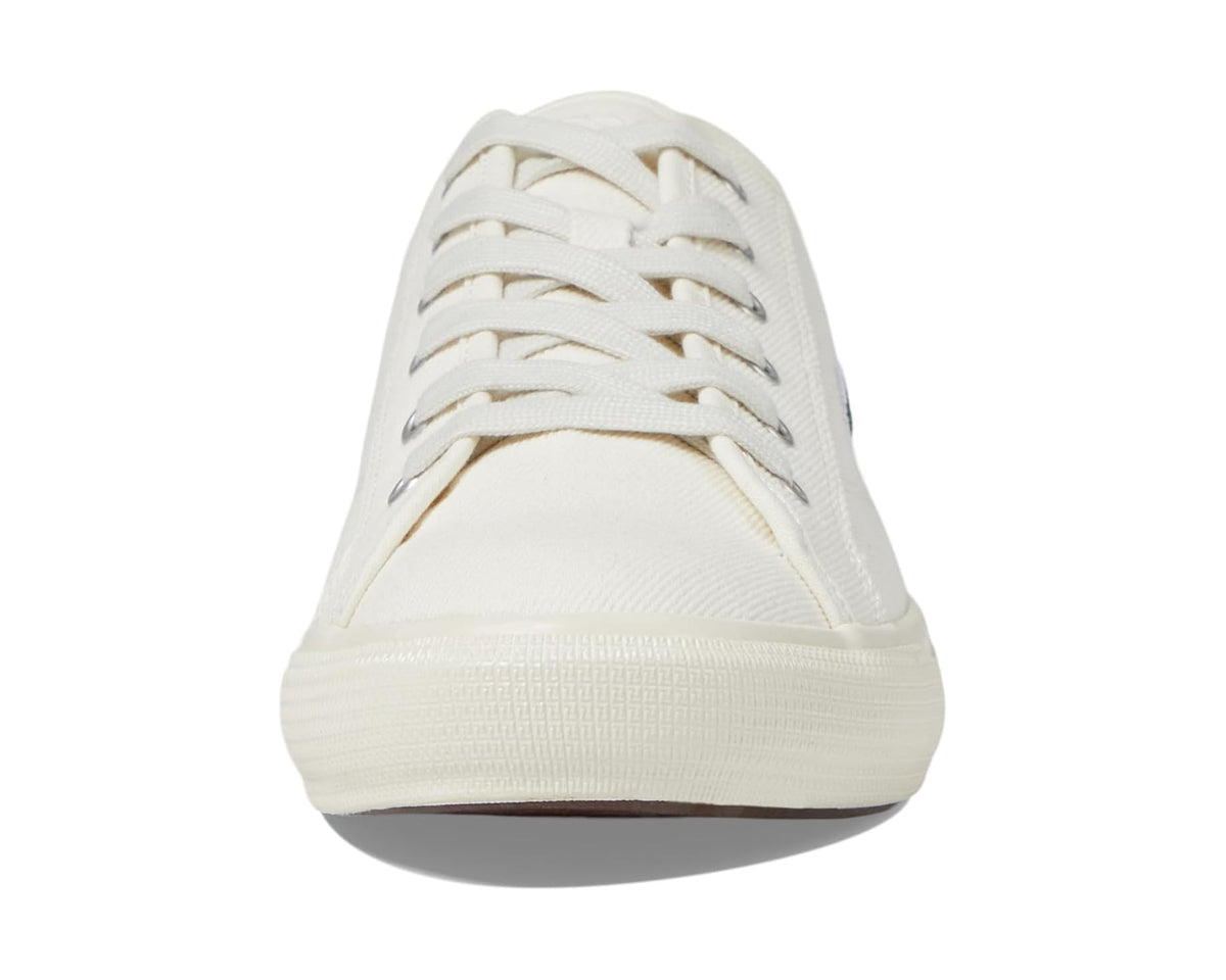 Lacoste Backcourt off-white sneakers, front view with rounded toe and lace-up
