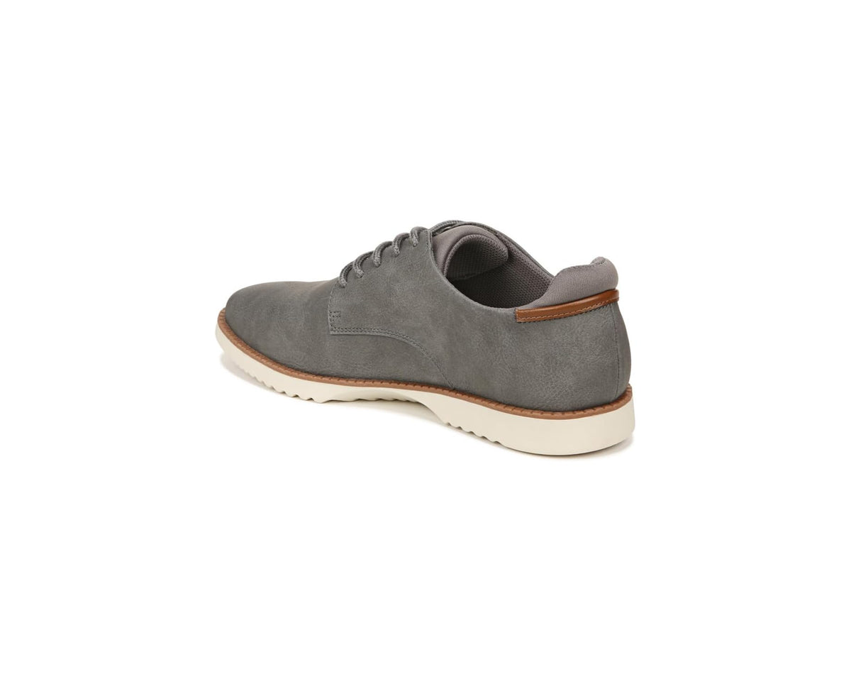 Dark grey lace-up sneaker side view with white rubber sole and tan heel trim