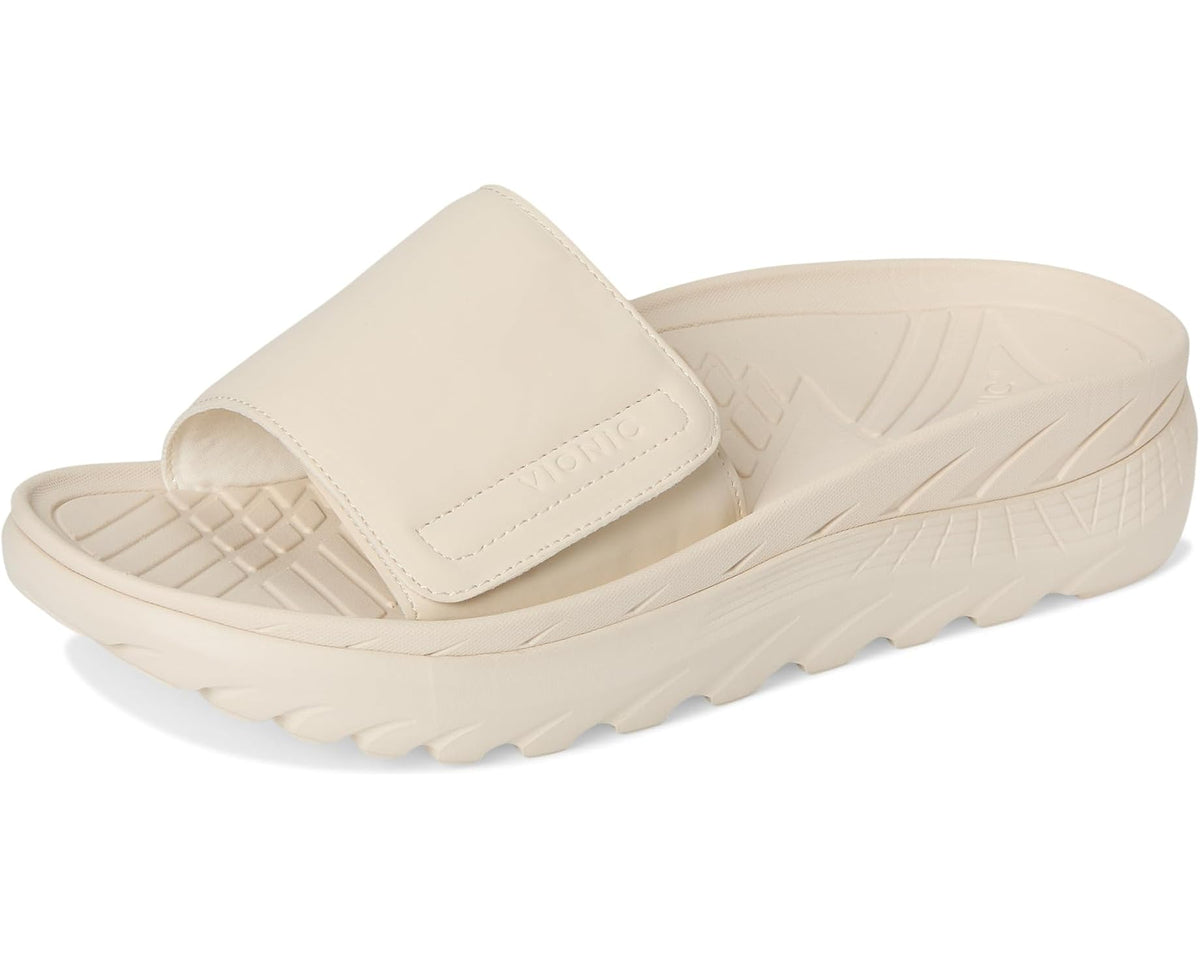 Cream unisex slide sandal with wide strap and grippy outsole
