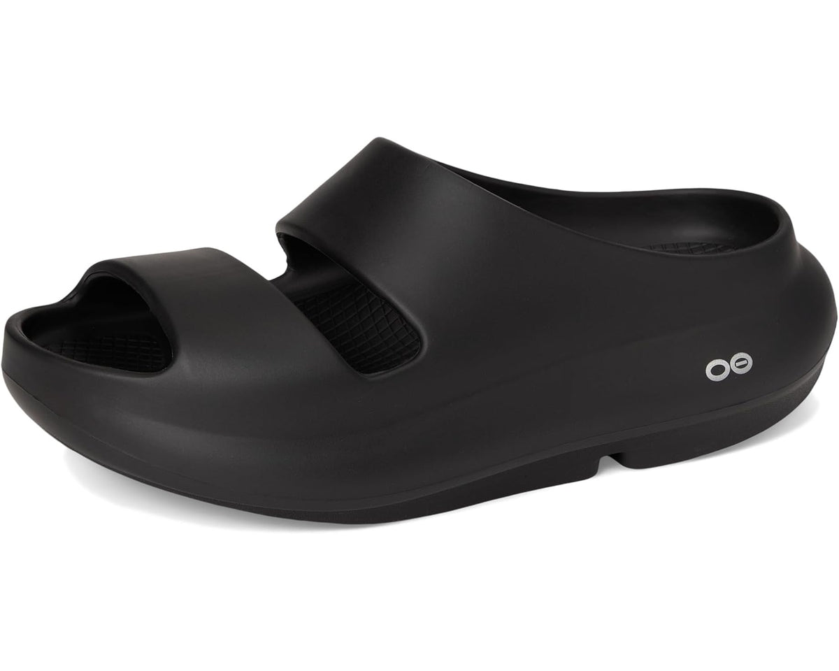 Black unisex slip-on clogs front angle with open heel, two bands, and logo.