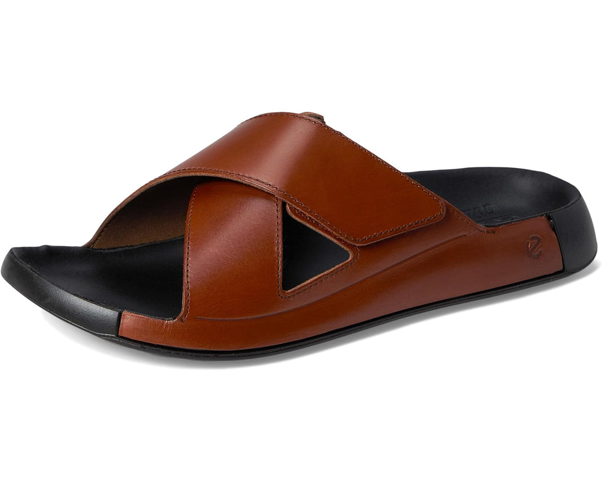 Cognac leather two-strap cross-slide sandal with black rubber footbed