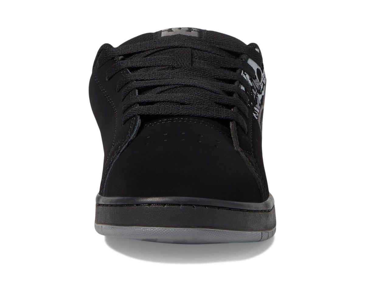 Black lace-up skate sneakers with subtle skull print on heel and toe.