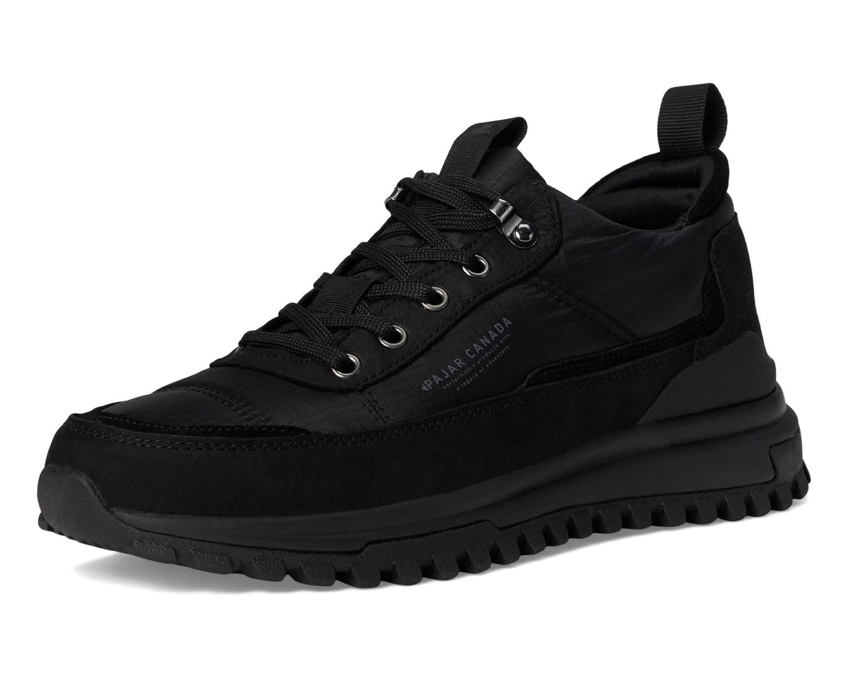 Fero Low sneaker front three-quarter view in black with chunky tread sole