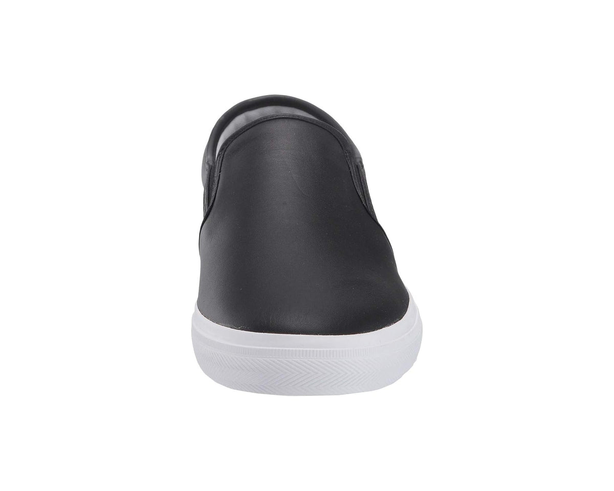 Black slip-on sneaker heel view with rounded collar and white rubber sole