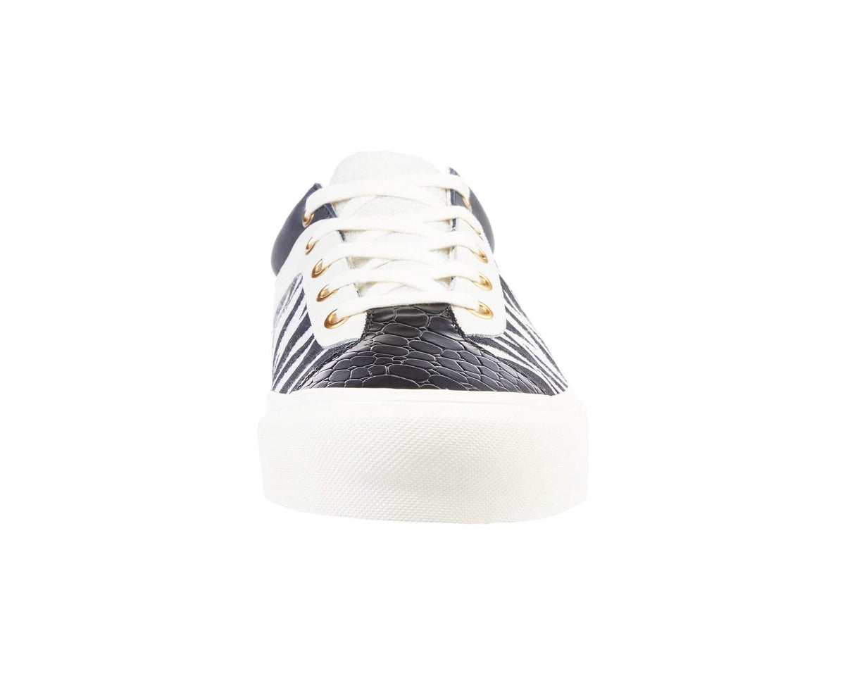 Unisex low-top skate shoes with navy zebra upper and white laces in back view