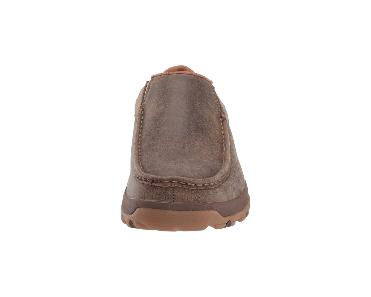 Men's suede slip-on moccasin shoe back view showing heel seam and rubber sole