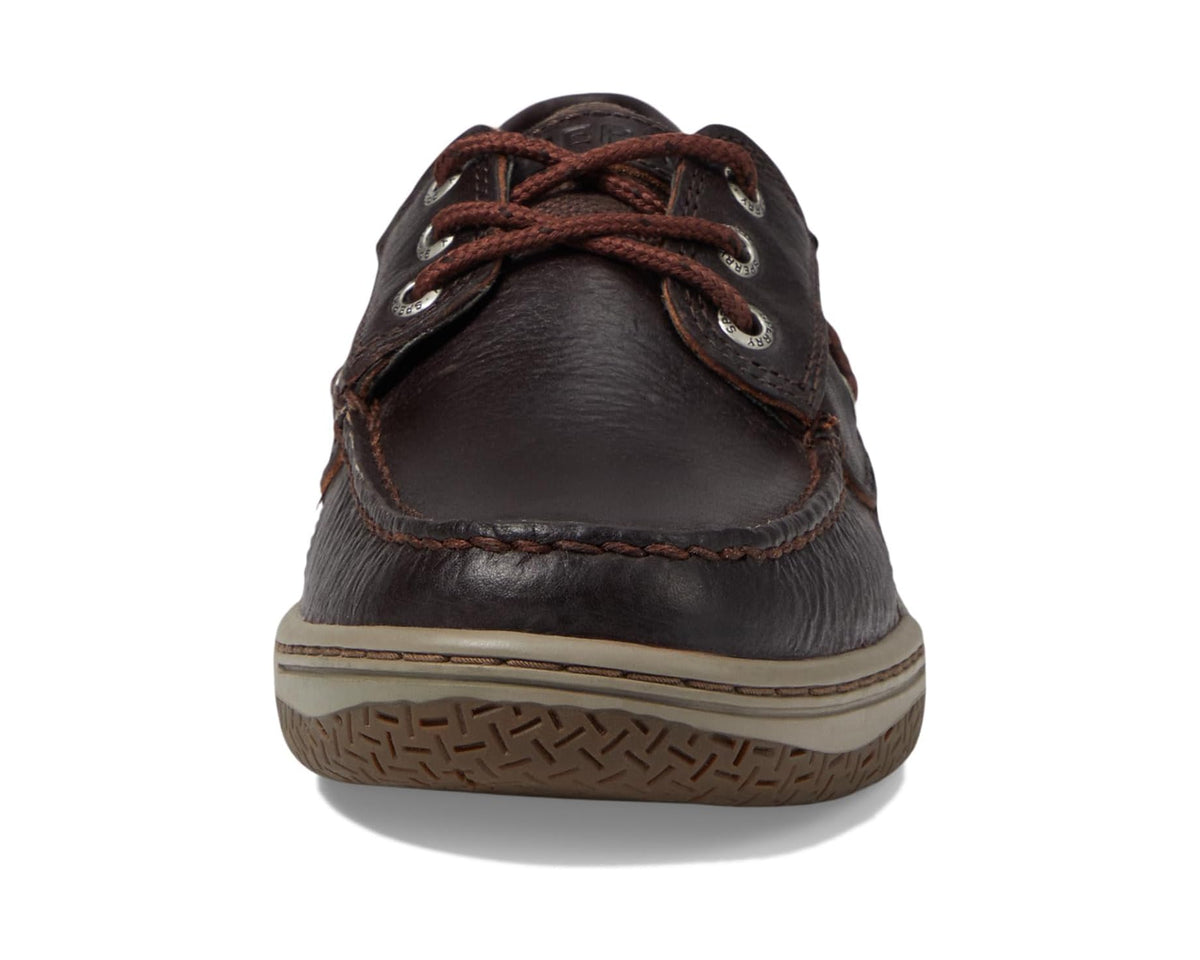 Sperry deck shoe toe view, brown leather with rust laces and stitched moccasin seam