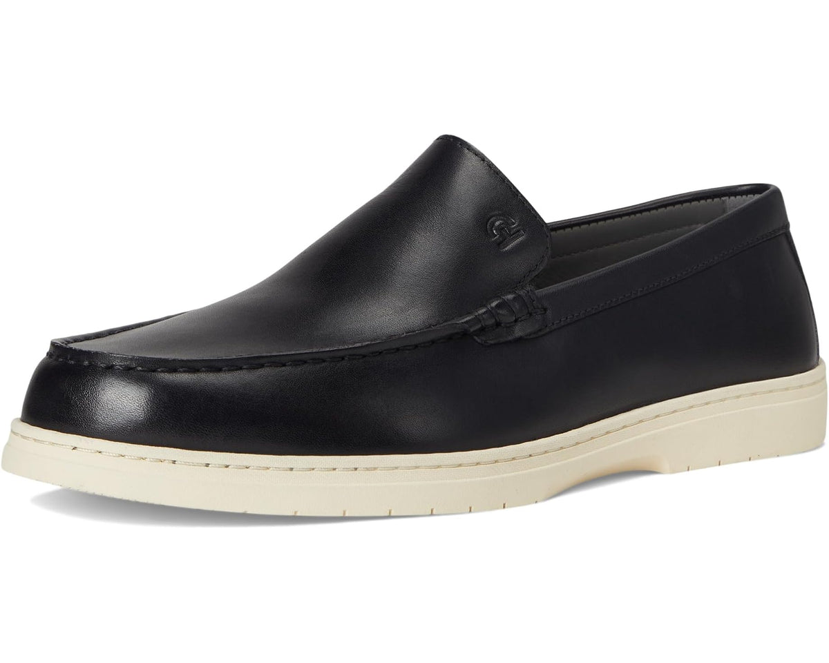 Black leather slip-on loafer with ivory sole and moc-toe seam detail