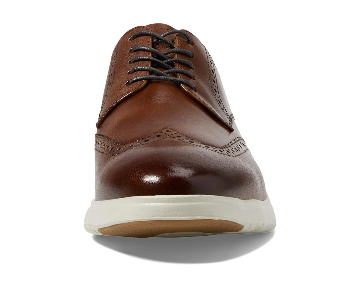 Florsheim men's lace-up oxford sneaker front view, cognac leather with white sole