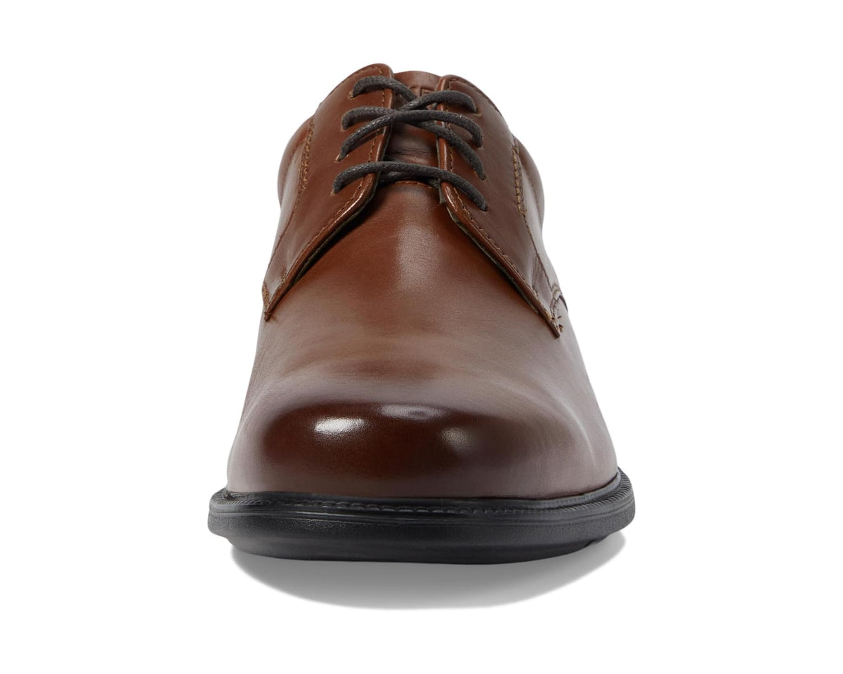 British tan Oxford shoe front view with lace-up and glossy leather finish