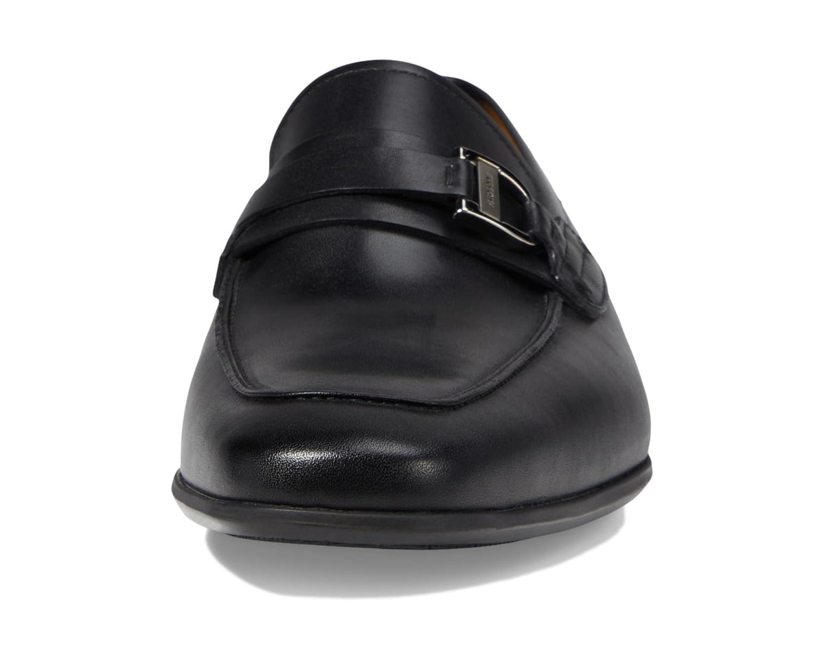 Black leather loafer back view with buckle strap and low heel