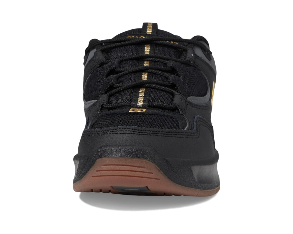 Men's black DC lace-up sneaker from back with brown outsole and gold lace accents