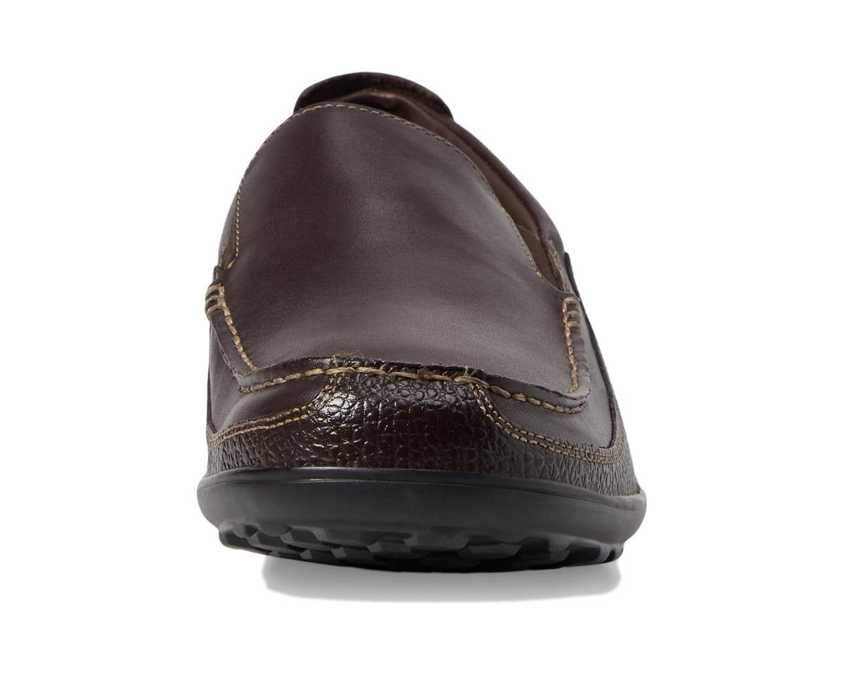 Dark brown leather loafer heel with low-profile rubber sole and stitched upper