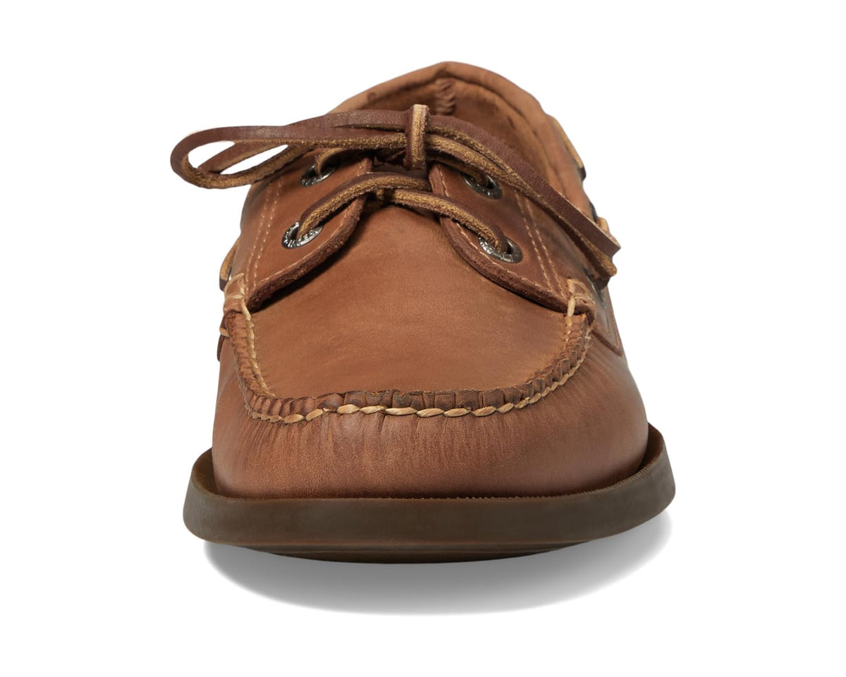 Light brown leather boat moc shoes with tied laces and padded collar