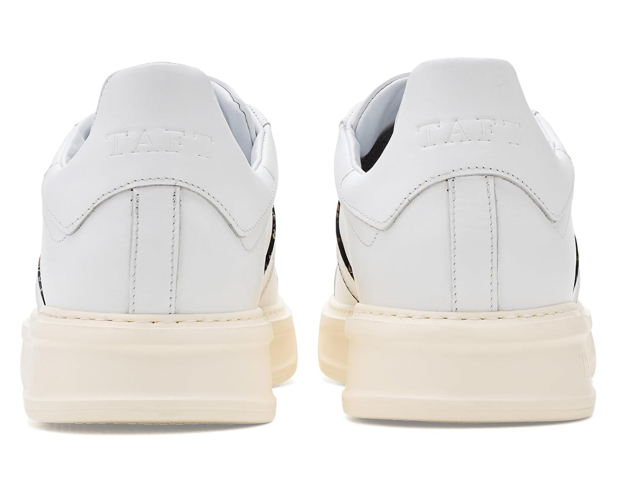 Back view of white low-top lace-up sneakers with heel branding and tan sole