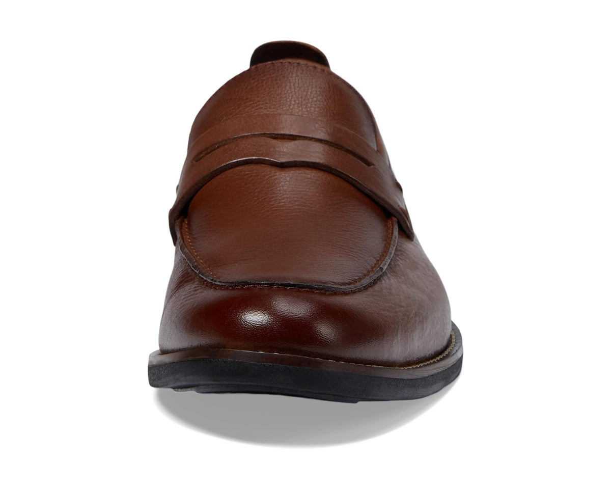 Men's brown leather loafer back view with saddle strap detail and rubber sole