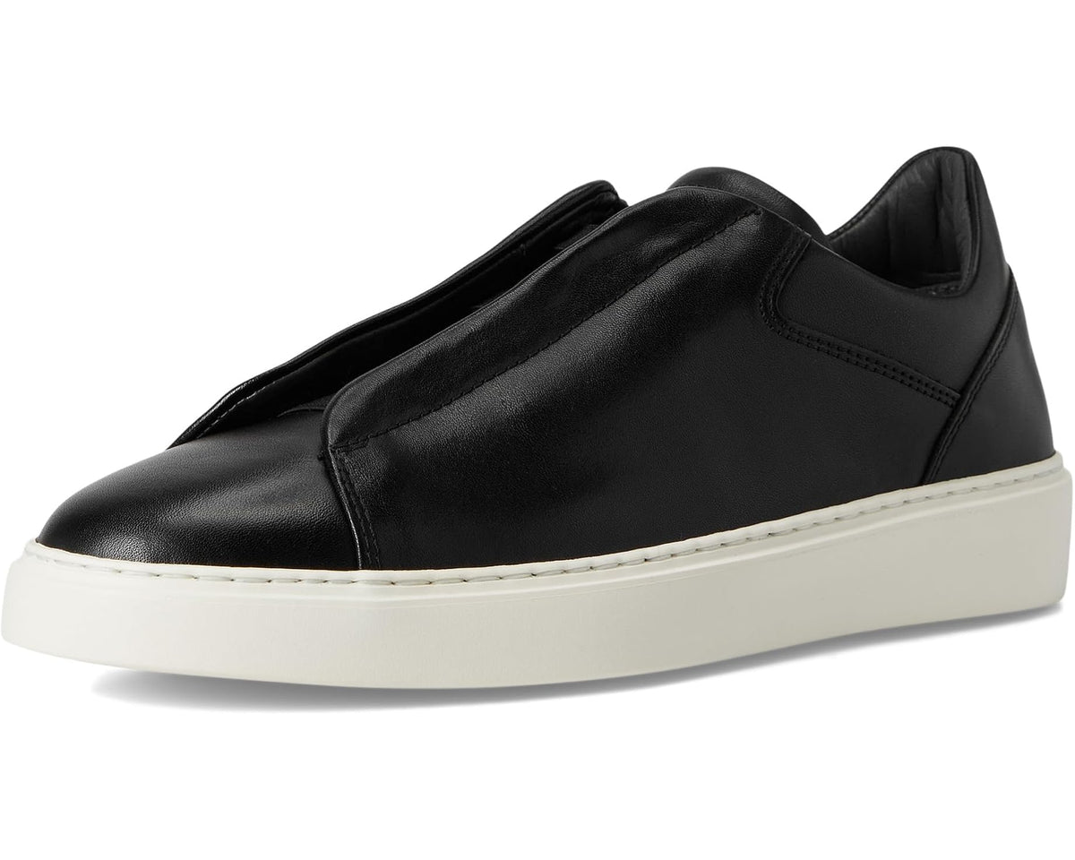 Black leather slip-on sneakers with side panel stitching and white rubber sole.