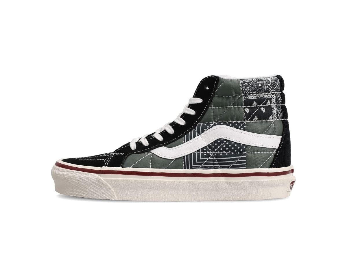 Vans high-top sneakers in black with quilted side panels, white stripe, and burgundy trim