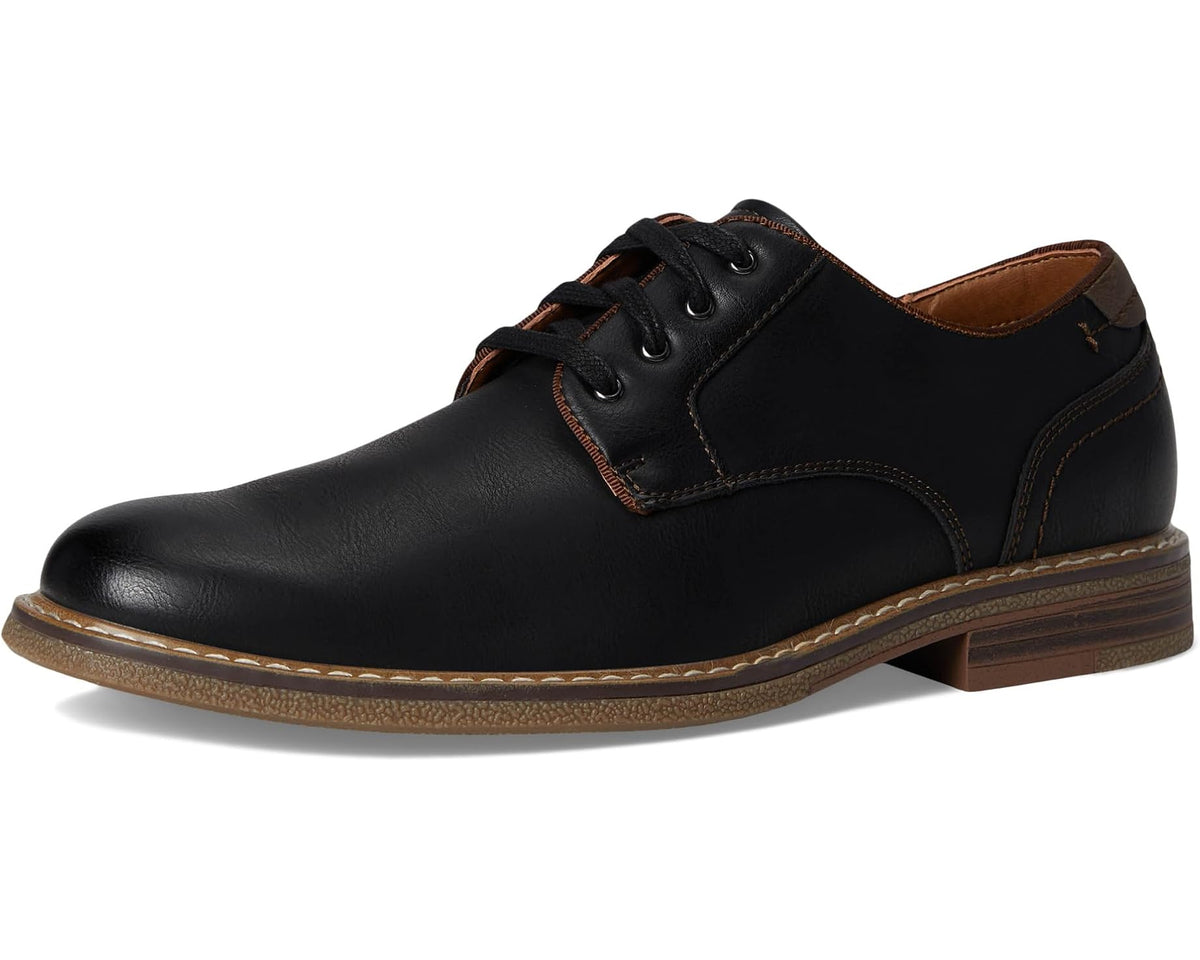 Black leather lace-up oxford shoe with brown sole and contrast orange stitching.