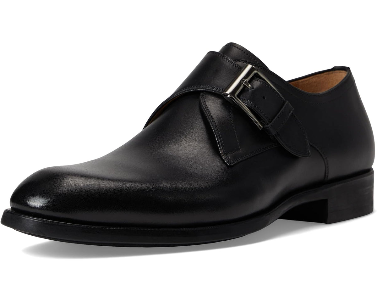 Black leather men's dress shoe with double buckle strap, angled front view.
