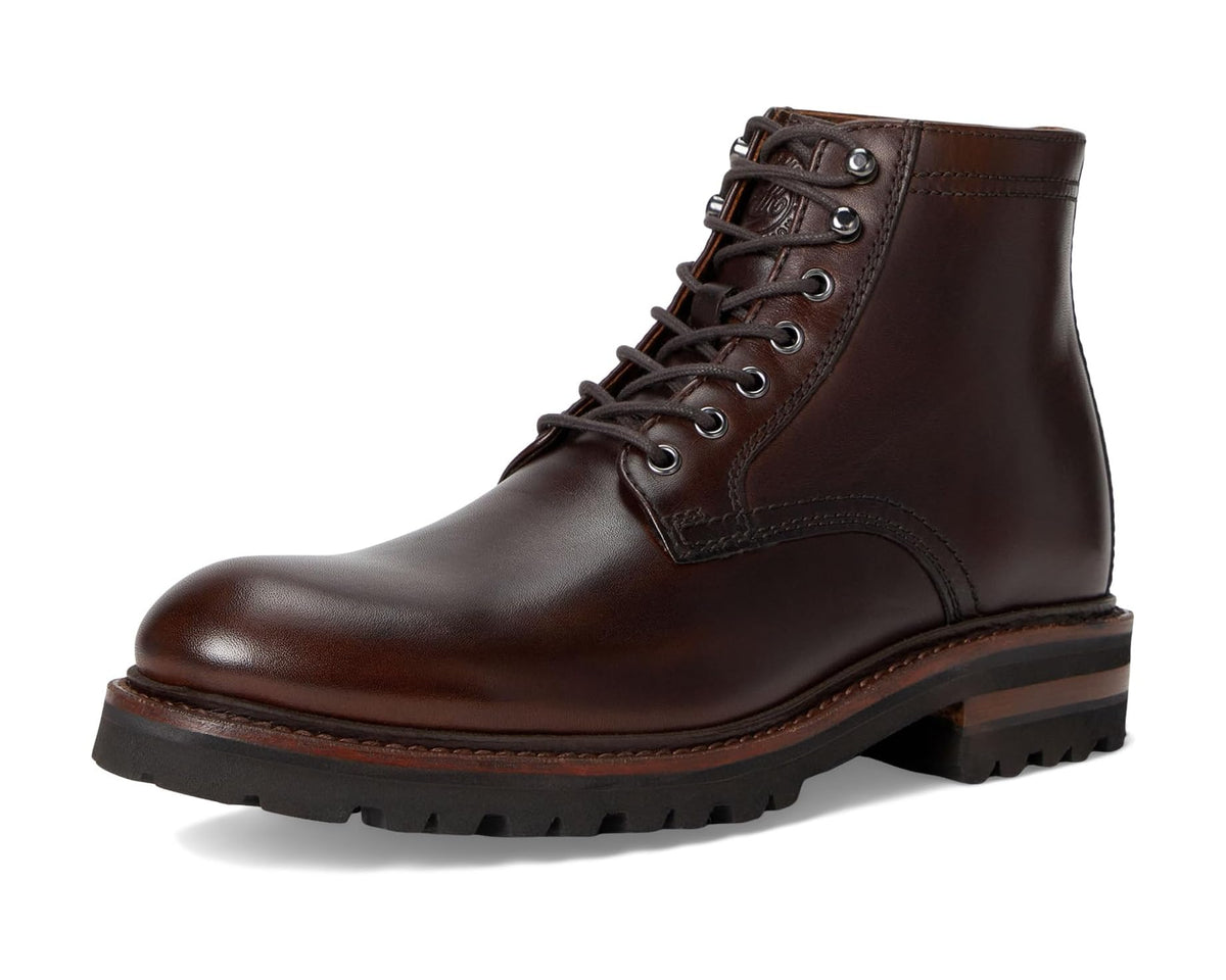 Brown lace-up plain toe lug boot, side view, rugged tread and stitched ankle