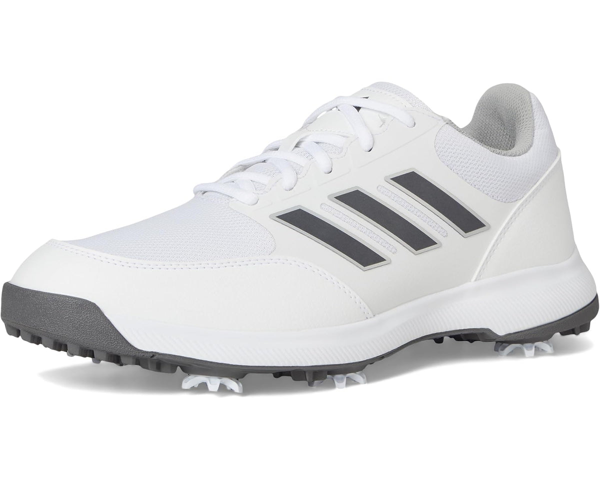 Men's adidas golf shoes, angled side view in white with dark silver stripes and spikes