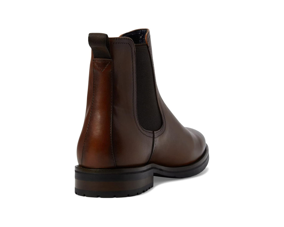 Tan leather ankle boots with elastic gore and reinforced heel collar