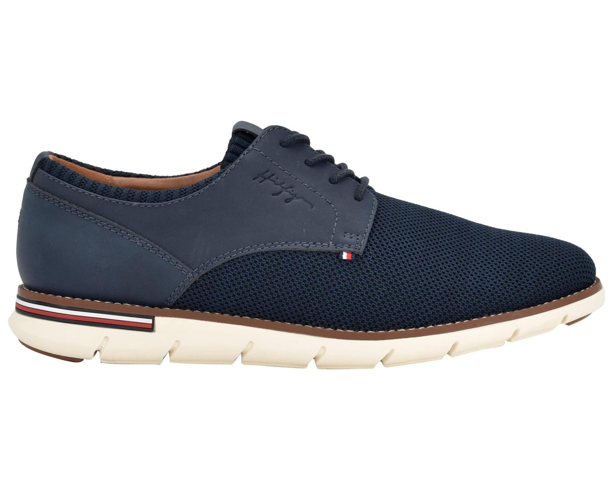 Men's navy lace-up casual shoe with perforated side and contrast stripe sole