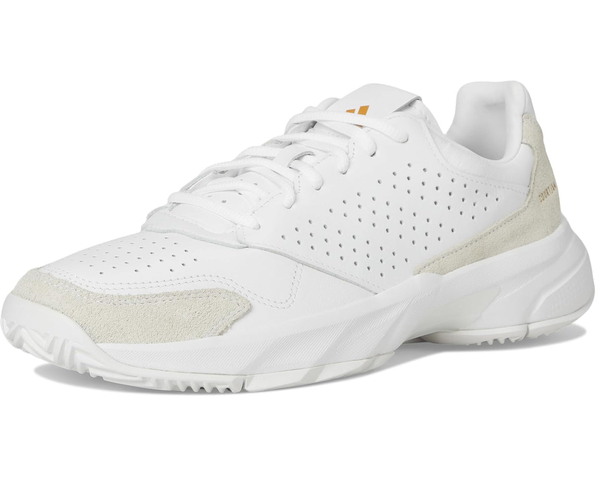 adidas unisex tennis shoe with white perforated upper and beige toe and side accents