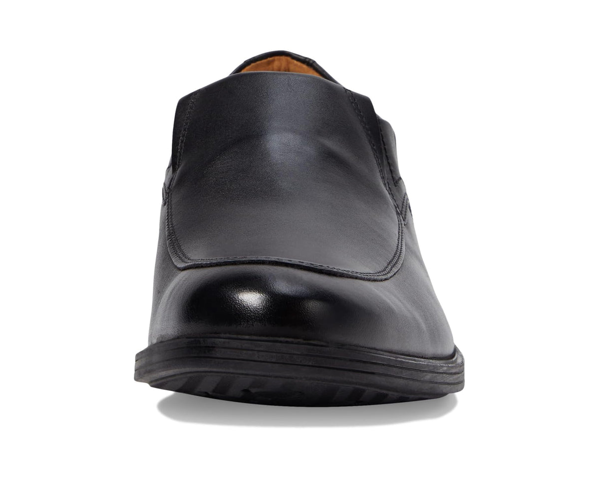 Men's black leather slip-on shoe back view with low profile heel and rubber sole