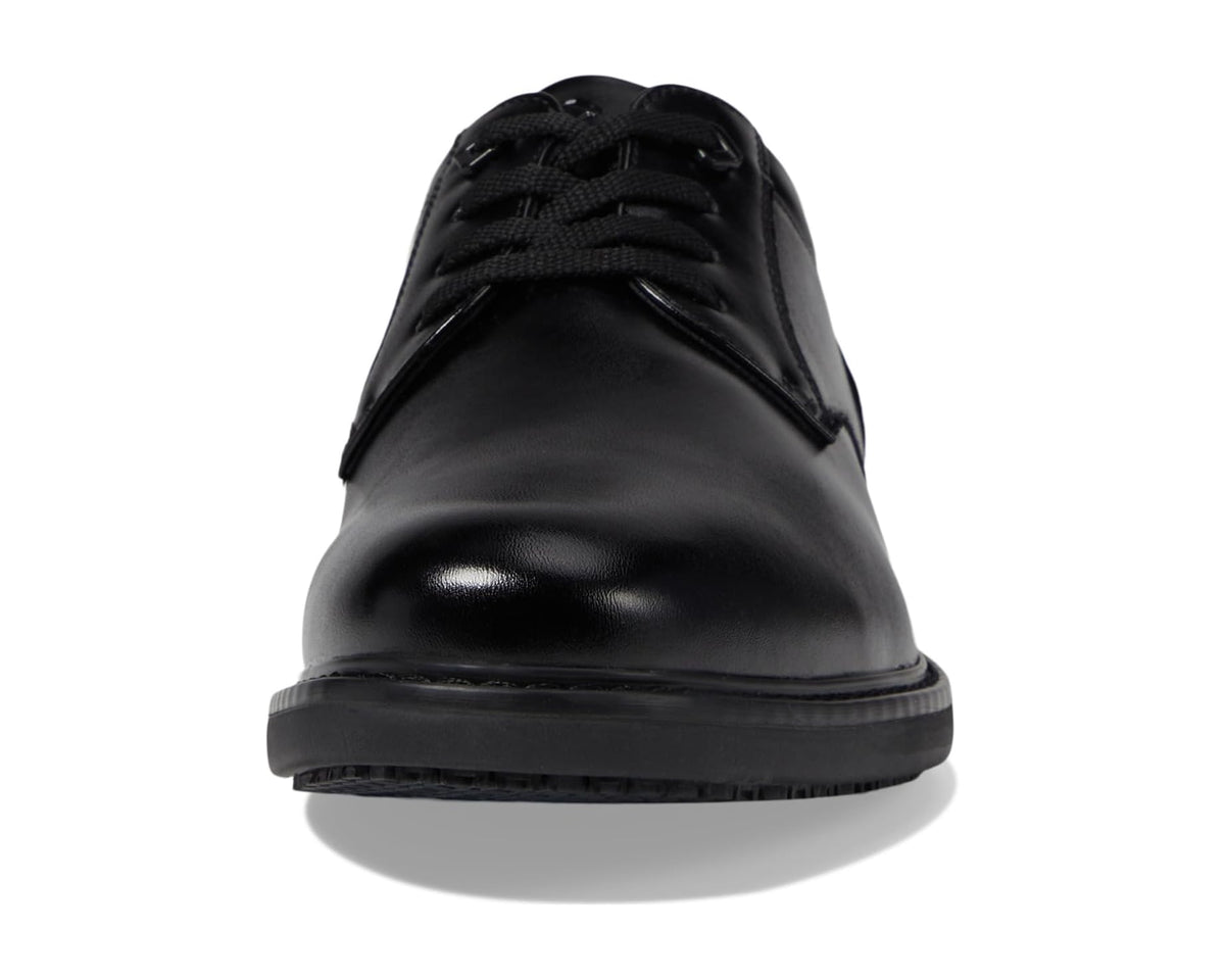 Black lace-up oxford shoe front view with smooth toe and rubber sole