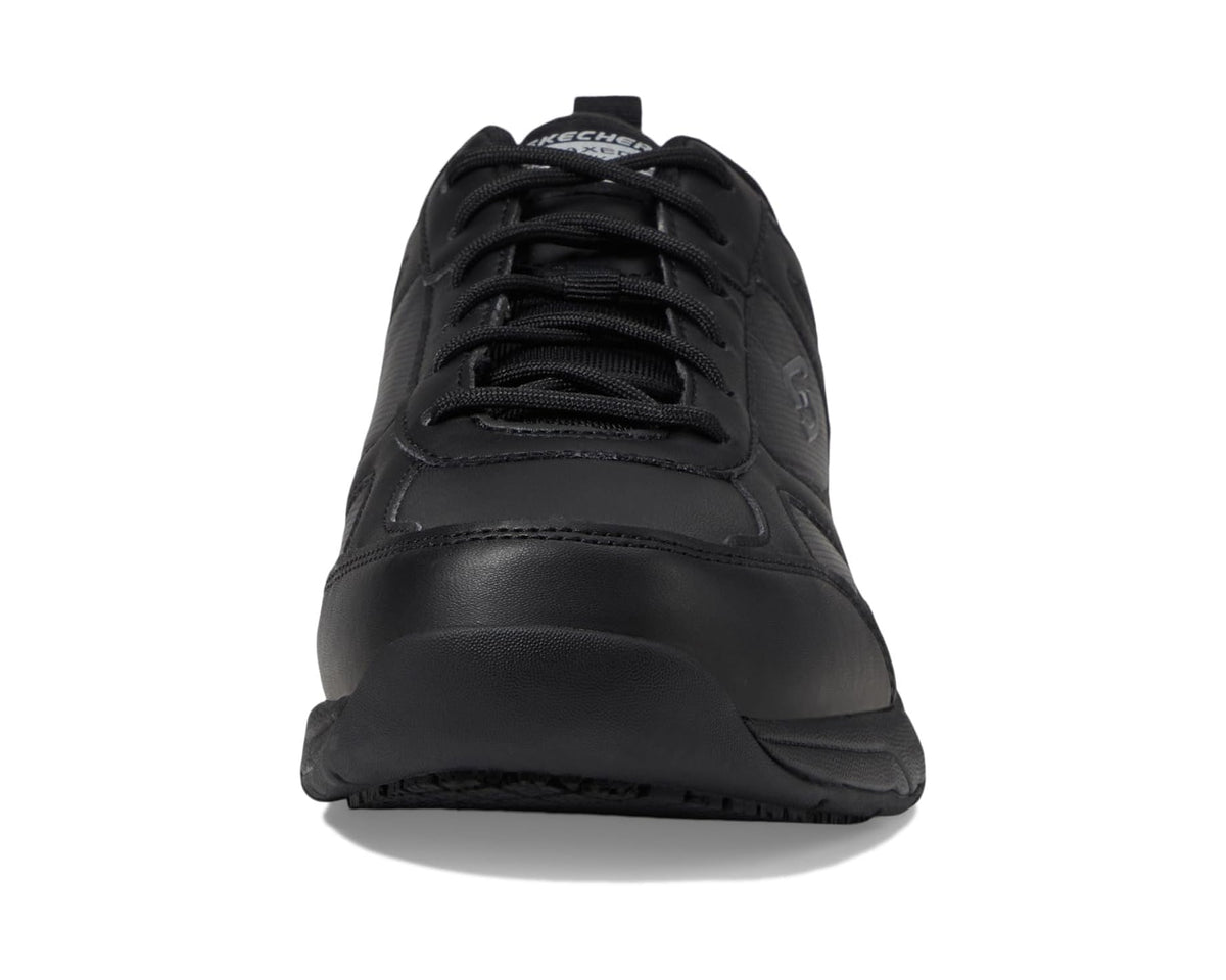 Black SKECHERS work shoe front with lace-up closure and rounded toe