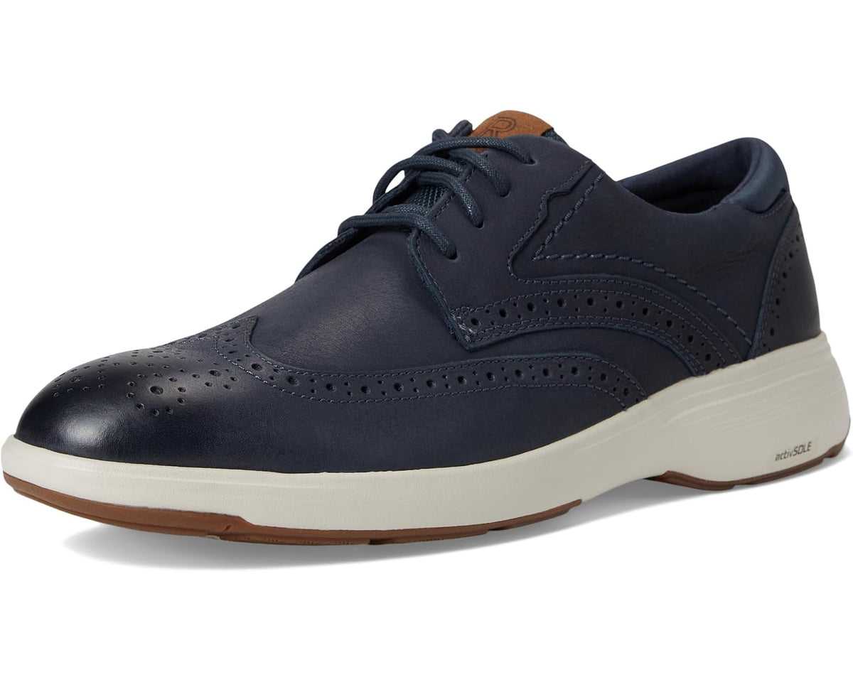 Men's dark blue leather wingtip lace-up sneaker with perforated panels and white outsole