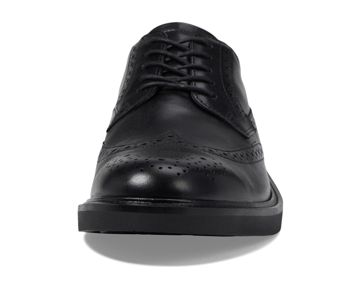 Black leather wingtip oxford front with lace-up and perforated toe cap