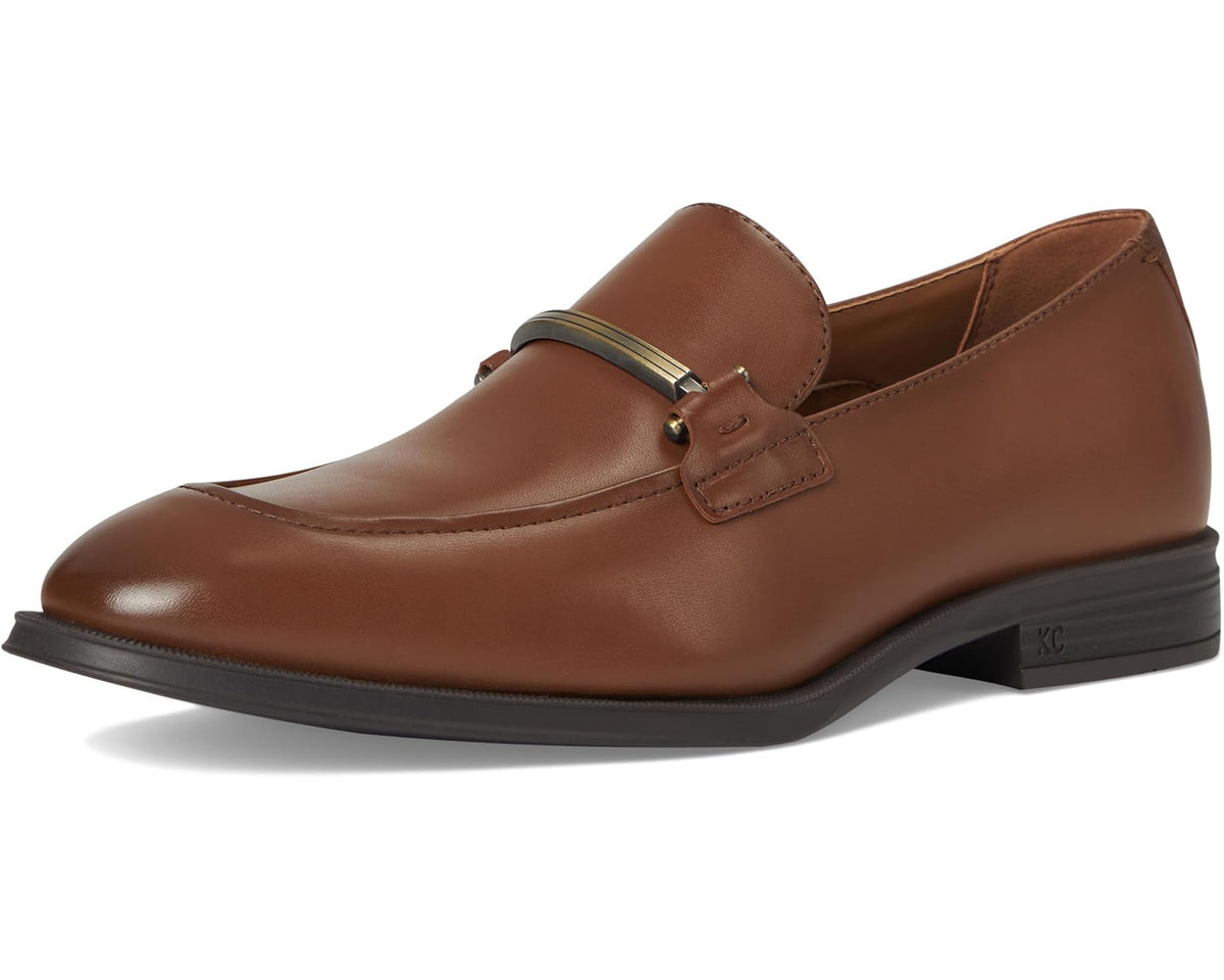 Brown leather slip-on loafer with metal strap keeper and smooth rounded toe
