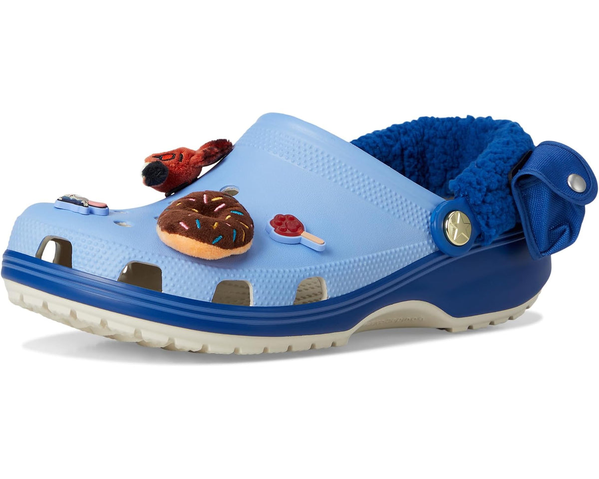 Light blue unisex Crocs clog with dark blue strap, plush lining, and donut charm