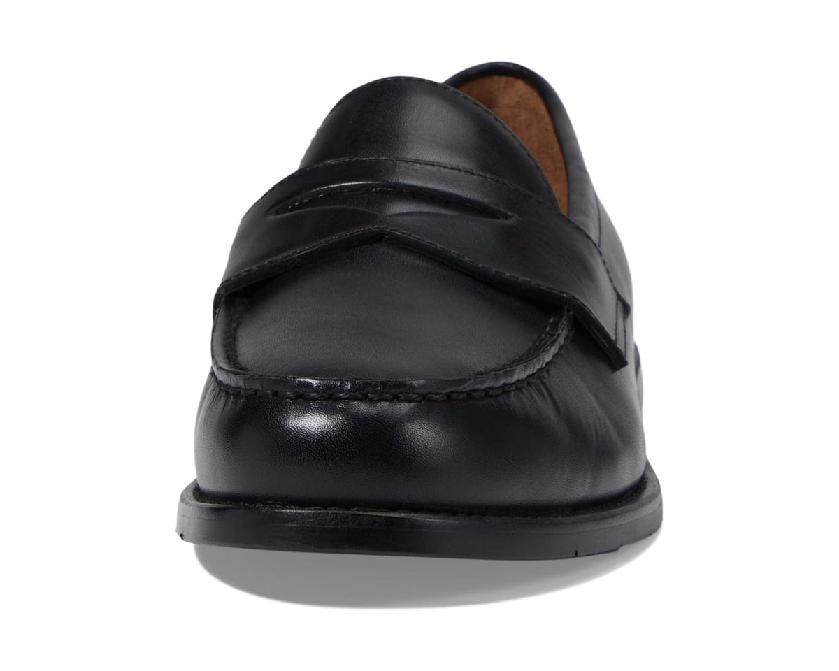 Black leather penny loafer back view with flat heel and seam details