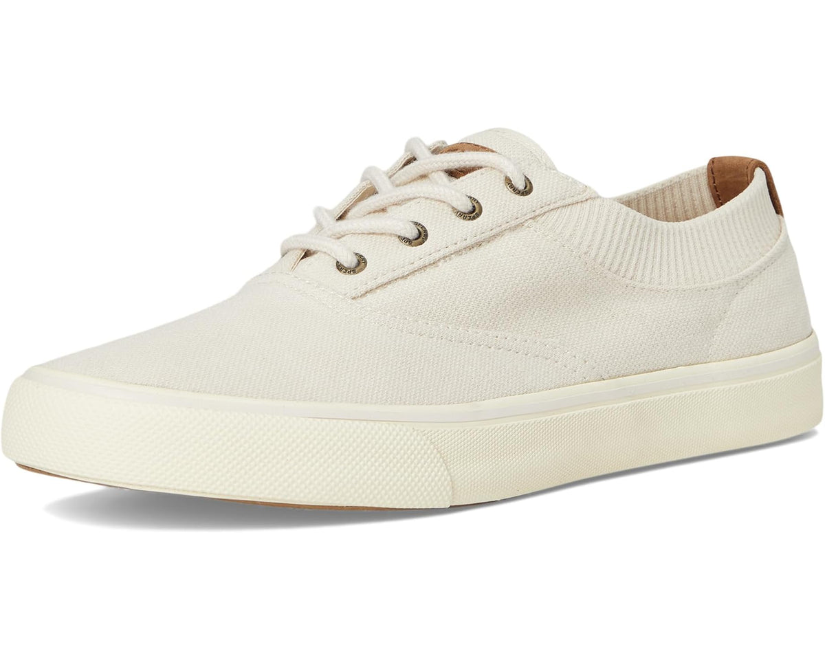 Men's Sperry Striper II knit sneakers, front three-quarter view in bone.
