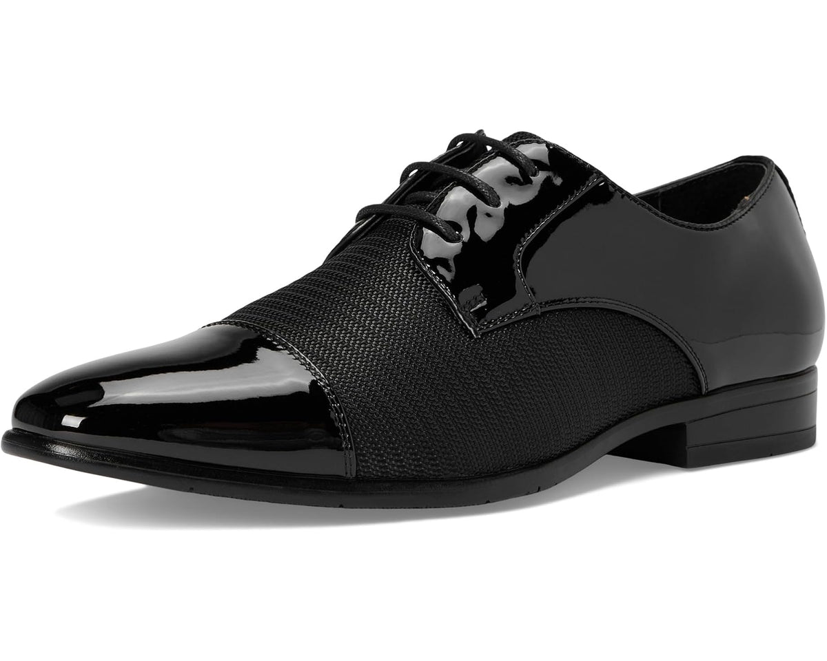 Black lace-up cap-toe oxford with textured vamp and glossy toe guard