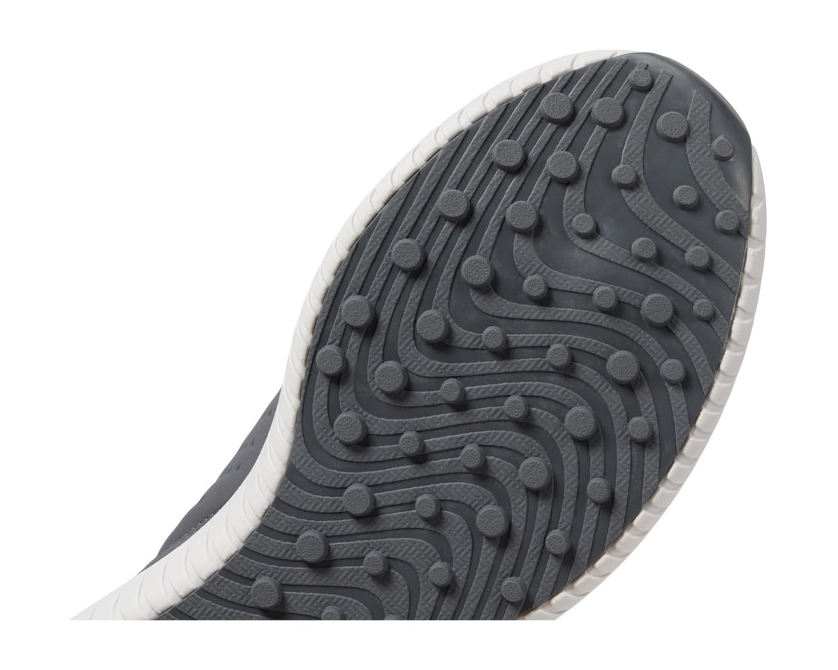 Grey rubber traction outsole with molded studs for golf grip