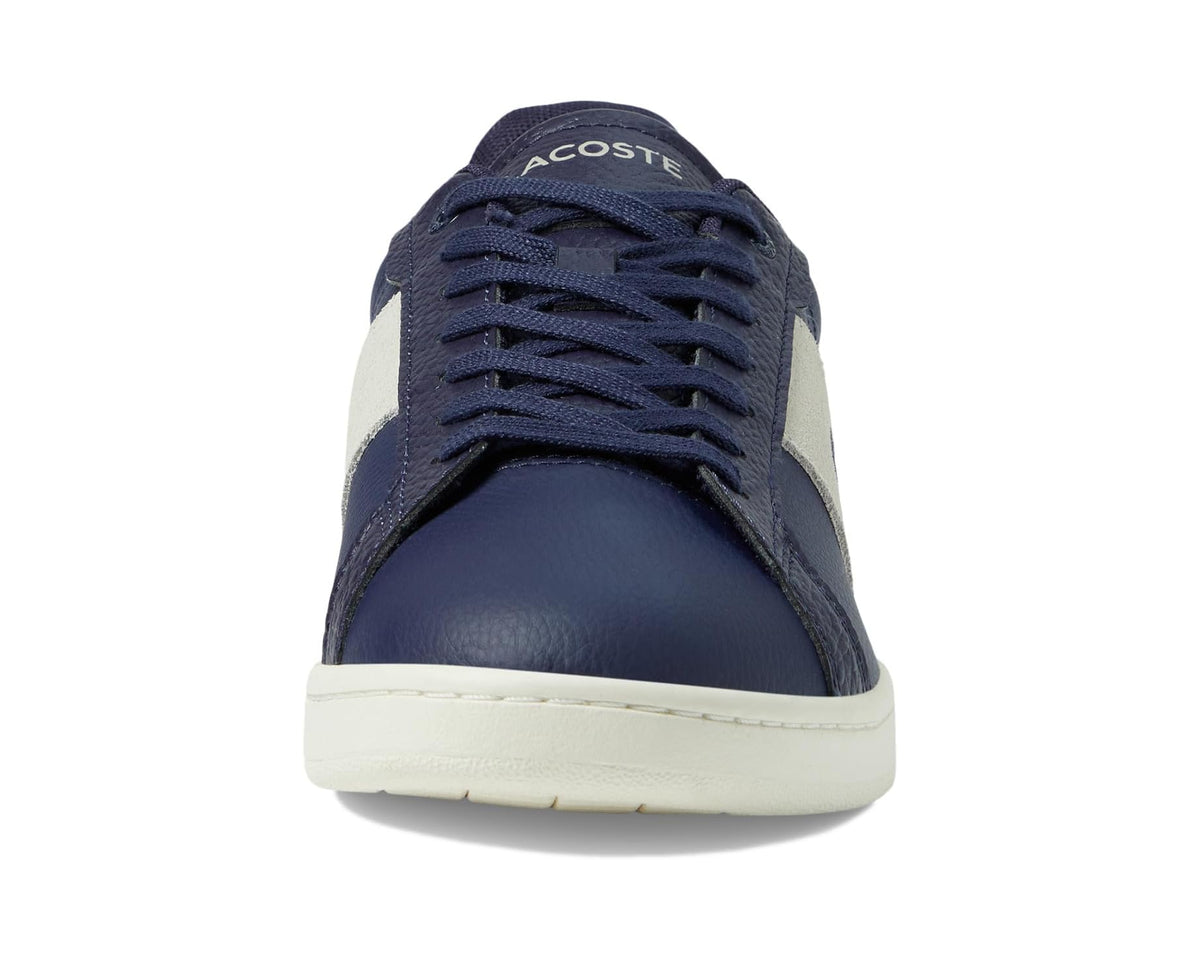 Navy Lacoste sneakers with lace-up vamp and off-white toe cap, front view